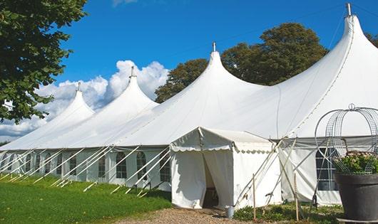 high-quality portable restrooms stationed at a wedding, meeting the needs of guests throughout the outdoor reception in Clifton Park